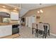 Kitchen with granite counters and stainless steel appliances at 3189 Tally Ho Rd, North Port, FL 34291