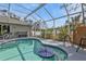 Inviting screened pool area, perfect for relaxation at 3189 Tally Ho Rd, North Port, FL 34291