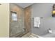 Large walk-in shower with tile surround at 3189 Tally Ho Rd, North Port, FL 34291