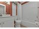 Bathroom with tub, toilet and vanity at 3380 Bay Ridge Way, Port Charlotte, FL 33953