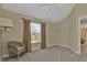 Simple bedroom with carpet, ceiling fan, and window at 3380 Bay Ridge Way, Port Charlotte, FL 33953