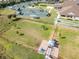 Aerial view of community dog park with tennis and bocce at 3380 Bay Ridge Way, Port Charlotte, FL 33953