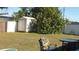 Spacious backyard with shed and patio furniture at 3380 Maple Ter, Port Charlotte, FL 33952