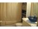 Clean bathroom with a blue vessel sink and shower/tub at 3380 Maple Ter, Port Charlotte, FL 33952