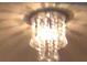 Close-up of a crystal chandelier at 3380 Maple Ter, Port Charlotte, FL 33952