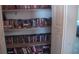 Shelving unit filled with DVDs and movies at 3380 Maple Ter, Port Charlotte, FL 33952