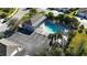 Community pool and lounge area with ample parking at 3533 Lakewood Blvd, North Port, FL 34287