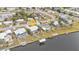 Aerial view of property near the waterfront at 407 Dunn Ne Dr, Port Charlotte, FL 33952