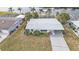 Aerial view of single-story home with water access at 407 Dunn Ne Dr, Port Charlotte, FL 33952