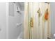 Bathroom with shower/tub combo and patterned shower curtain at 407 Dunn Ne Dr, Port Charlotte, FL 33952