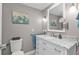 Clean bathroom with white vanity and marble countertop at 407 Dunn Ne Dr, Port Charlotte, FL 33952