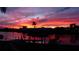 Stunning sunset over the canal, beautiful waterfront property at 407 Dunn Ne Dr, Port Charlotte, FL 33952