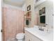 Clean bathroom with tub shower, vanity, and updated fixtures at 42 Santarem Cir, Punta Gorda, FL 33983