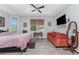 Spacious main bedroom with sitting area and large windows at 42 Santarem Cir, Punta Gorda, FL 33983