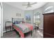 Cozy bedroom with a queen-size bed and ample natural light at 42 Santarem Cir, Punta Gorda, FL 33983