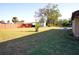 Large backyard with a shed and a wooden fence at 4200 Kilpatrick St, Port Charlotte, FL 33948