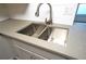 Sleek, double stainless steel sink with a modern faucet at 4200 Kilpatrick St, Port Charlotte, FL 33948