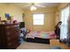 Charming bedroom with full bed and dresser at 422 Omen St, Punta Gorda, FL 33982