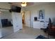 Bright bedroom with mirror closet and large TV at 422 Omen St, Punta Gorda, FL 33982