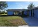 Covered carport area attached to the house at 422 Omen St, Punta Gorda, FL 33982