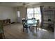 Dining area with glass-top table and four chairs at 422 Omen St, Punta Gorda, FL 33982