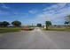 Community entrance with a welcoming sign and gated access at 422 Omen St, Punta Gorda, FL 33982