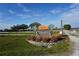 Community entrance sign for Peace River Shores on Jim Long Lake at 422 Omen St, Punta Gorda, FL 33982