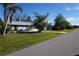 Ranch home with mature trees and lawn at 422 Omen St, Punta Gorda, FL 33982