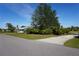 House with driveway and lush landscaping at 422 Omen St, Punta Gorda, FL 33982