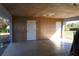 Unfinished garage interior with two doors at 422 Omen St, Punta Gorda, FL 33982