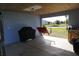 Garage with covered swing and grill at 422 Omen St, Punta Gorda, FL 33982