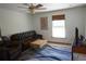 Living room with brown couches and a coffee table at 422 Omen St, Punta Gorda, FL 33982