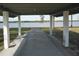 View from under a covered shelter, showcasing a tranquil river and natural landscape at 422 Omen St, Punta Gorda, FL 33982