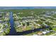 Aerial view of canal front home with private dock at 4630 Fallon Cir, Port Charlotte, FL 33948