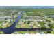 Aerial view highlighting waterfront home and neighborhood at 4630 Fallon Cir, Port Charlotte, FL 33948