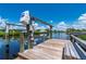 Private boat dock with lift, offering easy water access at 4630 Fallon Cir, Port Charlotte, FL 33948