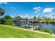 Private wooden dock on a calm canal at 4630 Fallon Cir, Port Charlotte, FL 33948