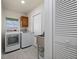 Laundry room with washer, dryer, and sink at 4630 Fallon Cir, Port Charlotte, FL 33948