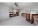 Spacious loft area with fireplace and built-in shelving at 4630 Fallon Cir, Port Charlotte, FL 33948