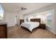 Main bedroom with large bed and backyard views at 4630 Fallon Cir, Port Charlotte, FL 33948