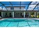 Enclosed pool and patio area, overlooking canal at 4630 Fallon Cir, Port Charlotte, FL 33948