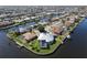 Bird's eye view of waterfront home on a corner lot at 490 Sorrento Ct, Punta Gorda, FL 33950