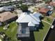 Aerial view of house and surrounding neighborhood at 490 Sorrento Ct, Punta Gorda, FL 33950