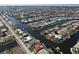 Aerial of canal front home with private dock and pool at 490 Sorrento Ct, Punta Gorda, FL 33950