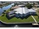 Aerial view of house and canal-front property at 490 Sorrento Ct, Punta Gorda, FL 33950