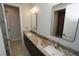 Bathroom with a double vanity and granite countertop at 490 Sorrento Ct, Punta Gorda, FL 33950