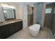 Bathroom with freestanding tub, double shower, and granite countertops at 490 Sorrento Ct, Punta Gorda, FL 33950