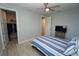 Bedroom with access to a large closet and bathroom at 490 Sorrento Ct, Punta Gorda, FL 33950