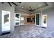 Covered patio with glass doors opening to the pool and main living area at 490 Sorrento Ct, Punta Gorda, FL 33950