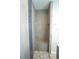 Walk-in shower with built-in seat and accent tile at 490 Sorrento Ct, Punta Gorda, FL 33950